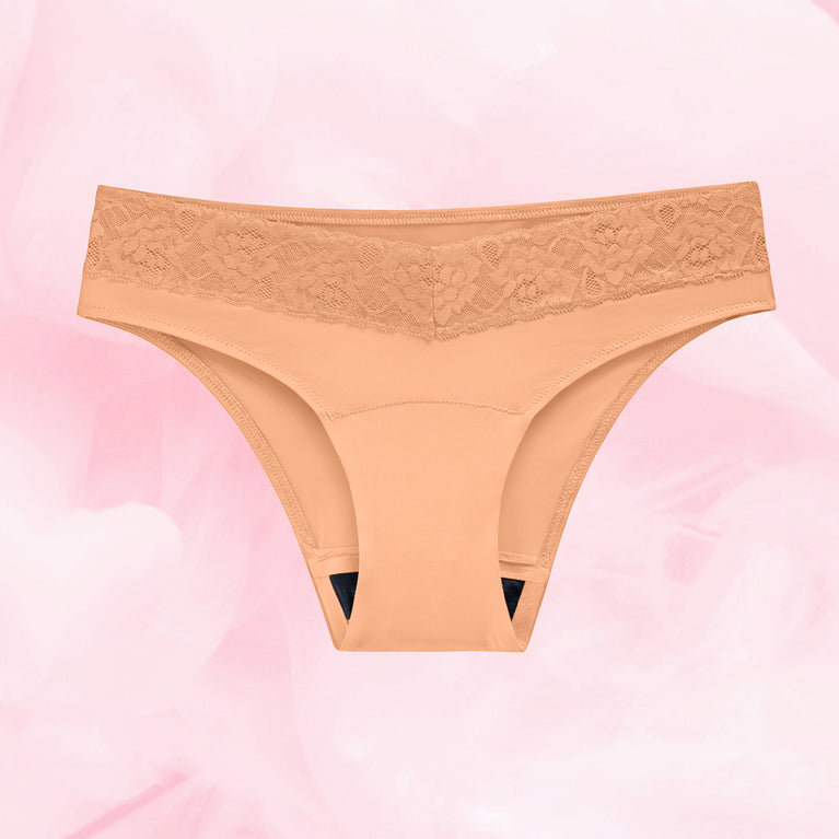 Brazilian Lite Mens Menstruse med blonder, lett peach/nude farge.