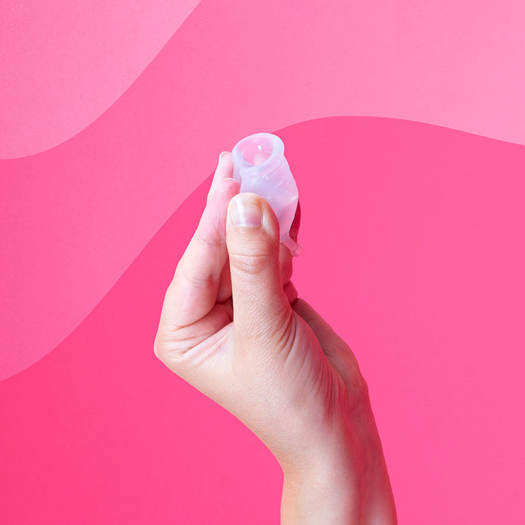 Menskopp, reusable medical silicone cup for 12-hour menstrual collection.