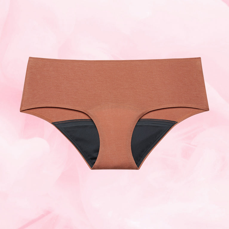 Premium Comfort Hipster Lite Mens menstruser i rustfarge med svart fôr.